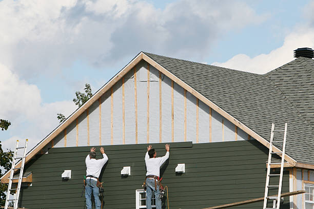 Professional Siding technician working in Inverness, CO